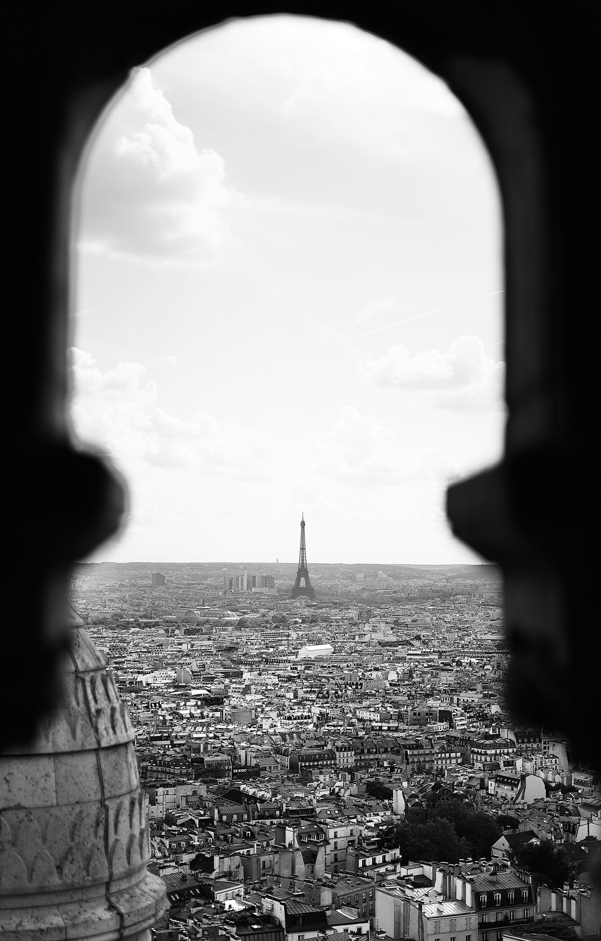 View of the Eifel Tower through a window.
