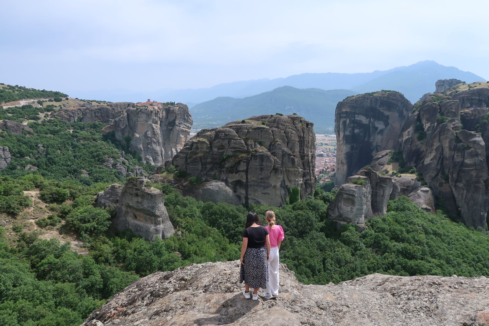 People admiring a mountain view